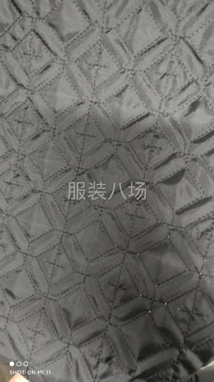 涤纶绗绣绗缝夹棉面料 女装秋冬款棉衣羽绒保暖布料半成品压棉-第4张图片